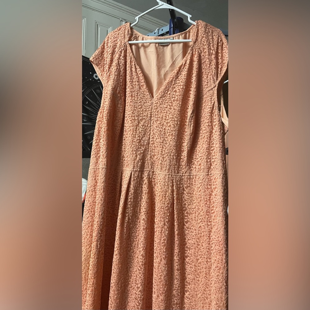 Pink lace like fabric dress